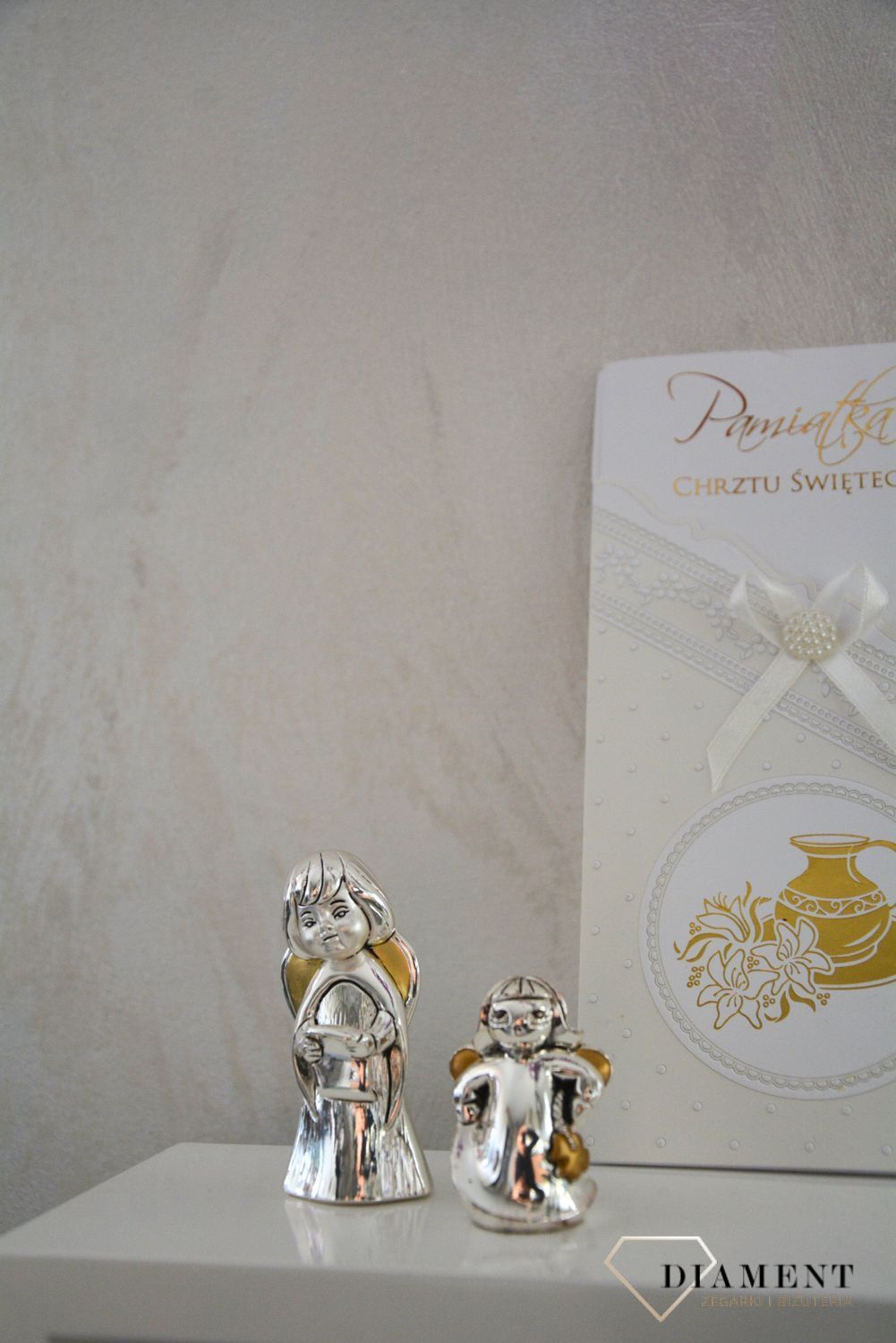 Figurka srebrna Aniołek z koniczynką na szczęście..jpg